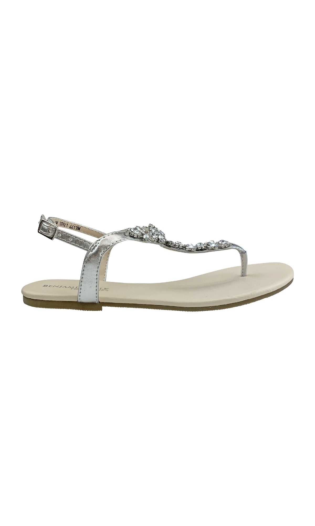 The Paula Silver Thong Sandal Prom Shoes (Touch Ups 4413) feature a beige sole, metallic silver straps, and rhinestone jewel trim on the upper strap.
